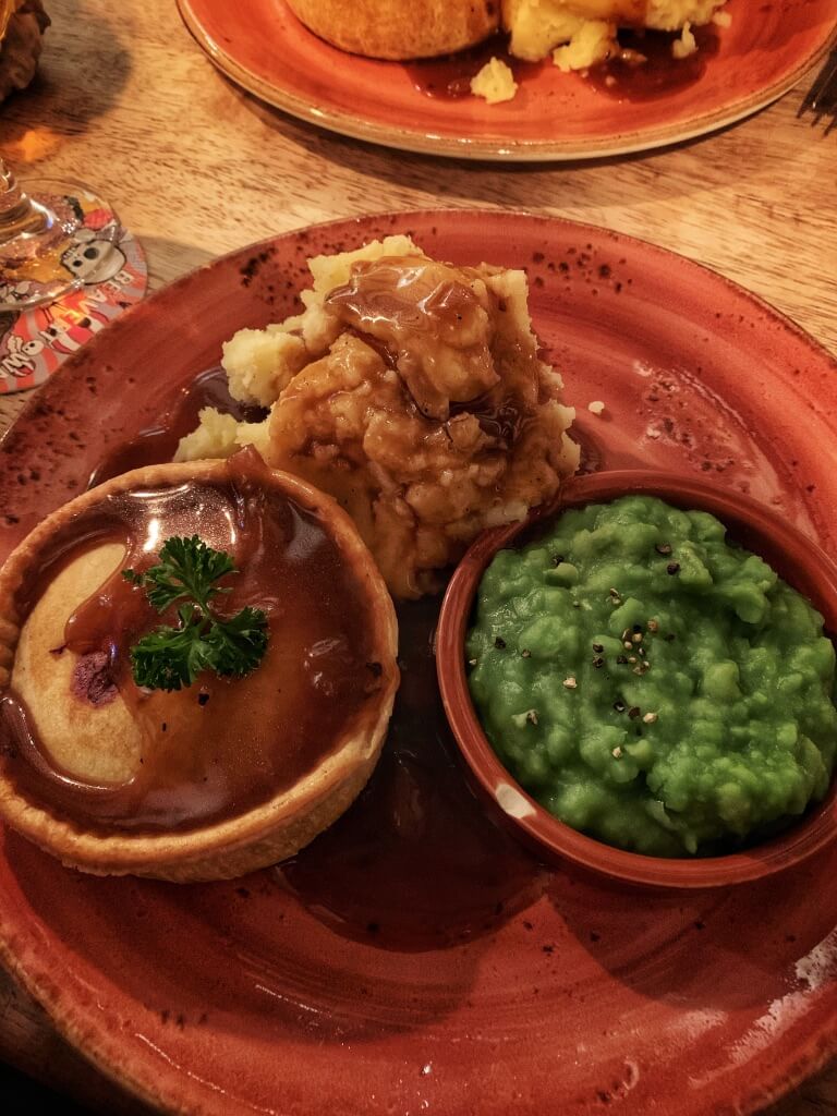 pie, mash and mushy peas served at The House of Trembling Madness