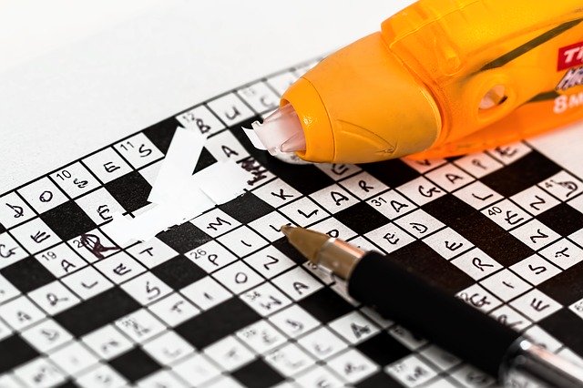 Completed crossword with tipex corrections